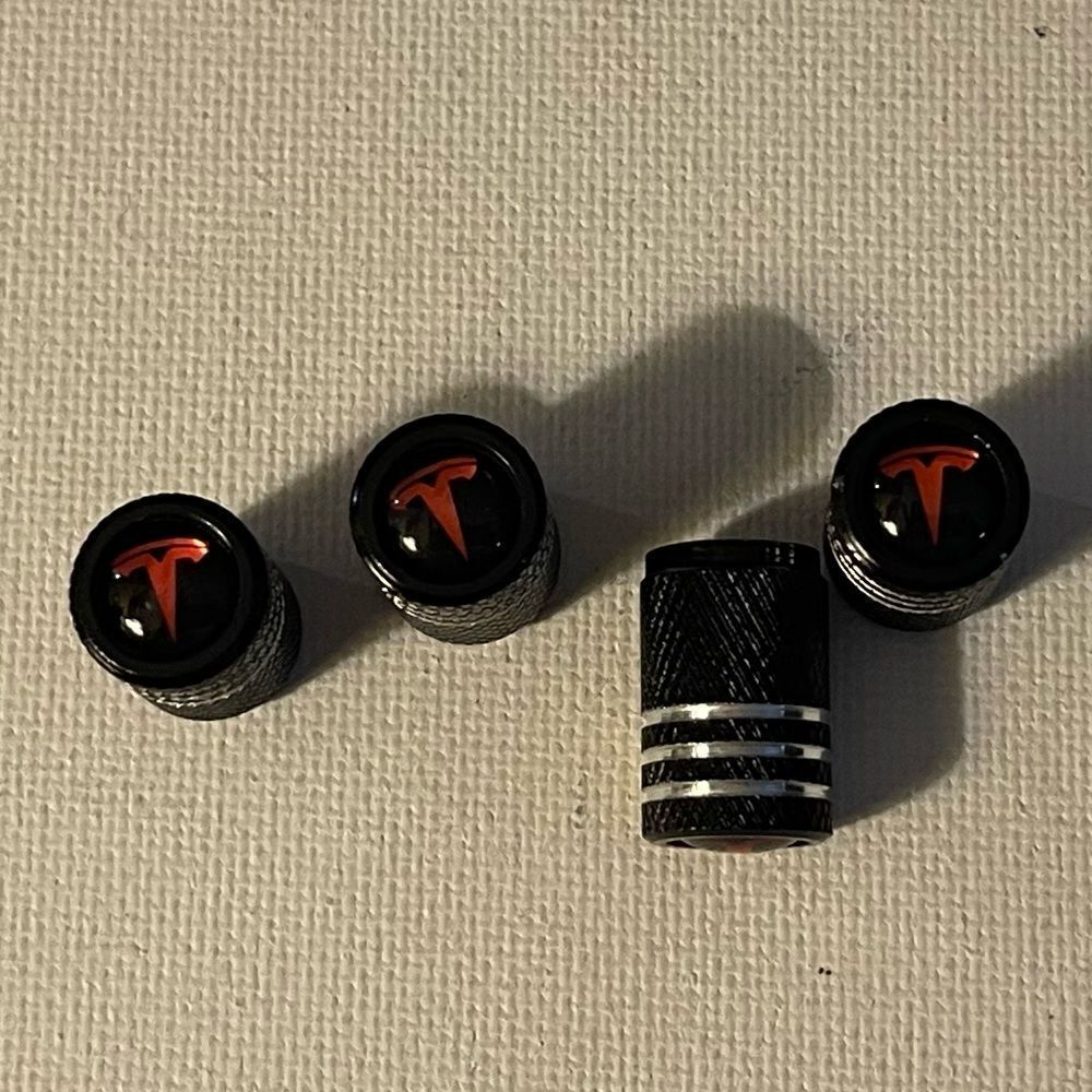 Tesla valve Stem caps in Black set of 4 NWT
